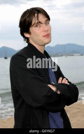 Actor Cillian Murphy poses for photographers during a photocall for Breakfast On Pluto, at the Carlton Beach during the 57th Cannes Film Festival in France. Stock Photo