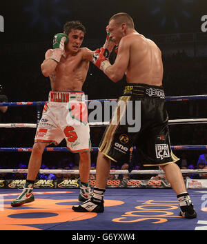 Anthony Crolla (left) and John Murray during the WBO Inter-Continental Lightweight Title bout at the Phones 4U Arena, Manchester. Stock Photo