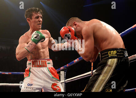 Anthony Crolla (left) in action against John Murray during the WBO Inter-Continental Lightweight Title bout at the Phones 4U Arena, Manchester. Stock Photo