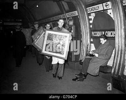 Eighty feet below the surface of Piccadilly Circus is part of the underground station known as 'Aladdins Cave' where national art treasures from the Tate gallery and the London Museum were stored at the outbreak of war. Most of the pictures have been returned to their galleries, but the remaining 200 were taken from the underground under police guard this morning Stock Photo