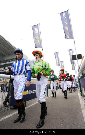 Horse Racing - 2014 William Hill Lincoln - Day Two - Doncaster Racecourse. Jockeys Paul Mulrennan (left) and Graham Lee walk from the weighing room prior to the William Hill Bet On The Move Handicap Stock Photo