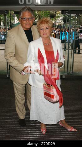 TV presenter Gloria Hunniford and her husband Stephen Way arrive for the UK premiere of Harry Potter And The Prisoner of Azkaban at the Odeon Leicester Square in Central London, the third film from author JK Rowling's series of books on the boy wizard. Stock Photo