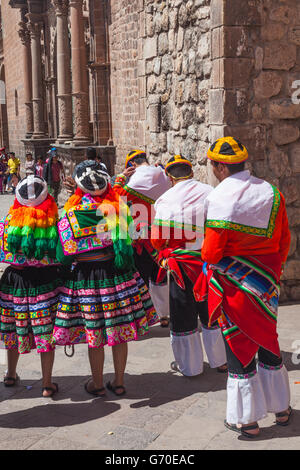 School dance troupe waiting to perform in front of the Basilica Merced in Cusco, Peru Stock Photo