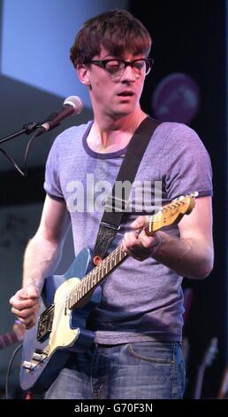 Graham Coxon performs live at HMV Oxford Street in central London, to promote his new album 'Happiness in Magazines' which was released. Stock Photo