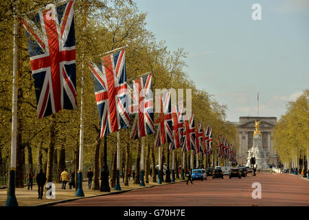 Flag lines The Mall looking towards Buckingham Palace, in Westminster central London. Stock Photo