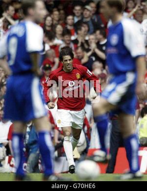 Manchester United's Ruud van Nistelrooy celebrates his first goal and United's second against Millwall in the FA Cup Final at the Millennium Stadium, Cardiff Saturday May 22 2004. Stock Photo