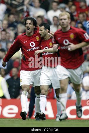Manchester United's Ruud van Nistelrooy celebrates with Ryan Giggs his second goal against Millwall during the FA Cup Final at the Millennium Stadium, Cardiff. Stock Photo