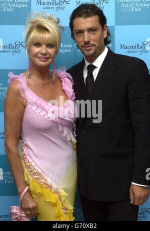 Ivana Trump and her boyfriend, italian model Rossano Rubicondi arrive for the charity gala evening at Grosvenor House Art & Antiques Fair on Park Lane in central London in aid of Macmillan Cancer Relief. Stock Photo