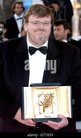 Michael Moore arrives for a special screening of his film Fahrenheit 9/11 as part of the 57th Cannes Film Festival in France. The Palme d'Or winning documentary closes the festival. Stock Photo