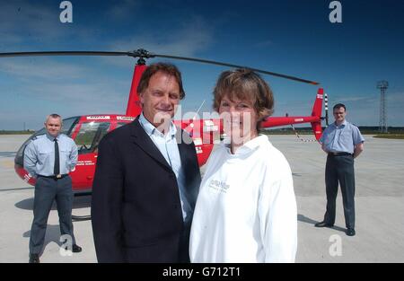 Colin Bodill and Jennifer Murray at RAF Kinloss where they were visiting the base which picked up the signal from their helicopter's distress beacon when it crashed December last year in Antarctica as the pair attempted a round-the-world record via the North and South Poles. Sergeant Gavin Thornton (left) and Corporal Craig O'Reilly were on duty in the Aeronautical Rescue Co-ordination Centre at the base in north-east Scotland on the day of the incident. Stock Photo