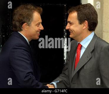 British Prime Minister Tony Blair (left) meets Spanish Prime Minister Jose Luis Rodriguez Zapatero at London's 10 Downing Street. Mr Blair was meeting his Irish and Spanish counterparts today in the run-up to a crunch summit on the wording of the European Union's new constitution. Stock Photo