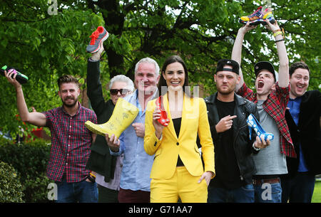 (from left) Original Rudeboys' Robert Burch, U2's Adam Clayton, Brent Pope, model Alison Canavan, Original Rudeboys members Neddy Arkins, Sean Walsh, and 98FM DJ Ray Foley at the launch of Walk in My Shoes in support of St. Patrick's Hospital Foundation, Dublin. Stock Photo