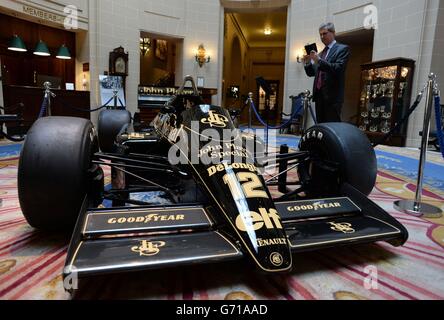 The Formula One Lotus racing car driven by the late Ayrton Senna, who was killed 20 years ago, goes on display at the Royal Automobile Club in London. Stock Photo
