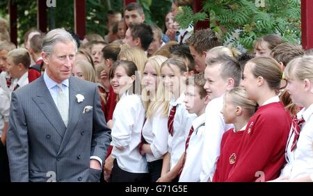 The Prince of Wales during his visit to Brimsham Green School in Yate, south Gloucestershire. The school takes its organic carrots and potatoes from the Prince's own Home Farm, near Tetbury in Gloucestershire. In his role as president of Business in the Community and patron of the Soil Association, Charles also conducted a summit meeting with a group of education chiefs to discuss the benefits of using fresh, good quality local food in schools. Stock Photo