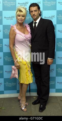 Ivana Trump and her boyfriend, Italian model Rossano Rubicondi arrive for the charity gala evening at Grosvenor House Art & Antiques Fair on Park Lane in central London in aid of Macmillan Cancer Relief. Stock Photo