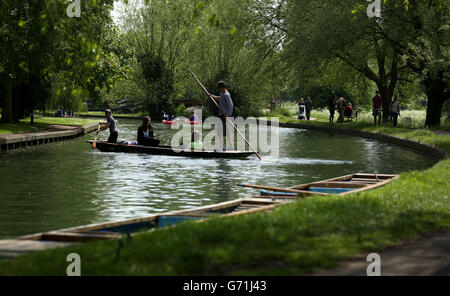 People punting on the River Cam in Cambridge as they enjoy the May Day Bank Holiday sunshine.