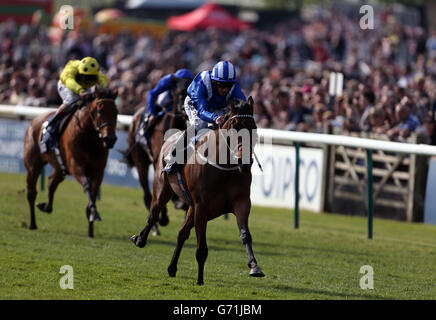 Taghrooda ridden by Paul Hanagan wins the Tweenhills Pretty Polly Stakes during day two of the 2014 QIPCO Guineas Festival at Newmarket Racecourse, Newmarket. Stock Photo