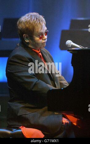 Singer Sir Elton John performing onstage during the press conference to announce Billy Elliot The Musical, held at the Royal Academy of Music, central London. Stock Photo