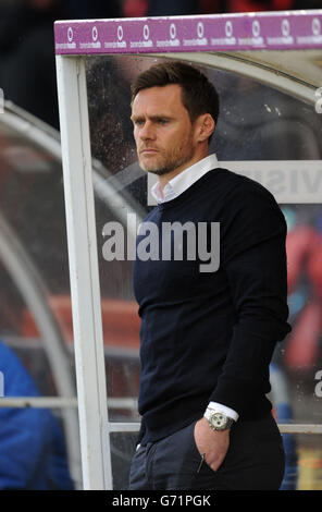 Fleetwood Town manager Graham Alexander with assistant Chris Lucketti ...