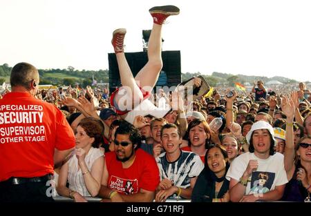 Music fans watch Franz Ferdinand perform live on the Other stage during the Glastonbury Festival, held at Worthy Farm in Pilton, Somerset. Stock Photo