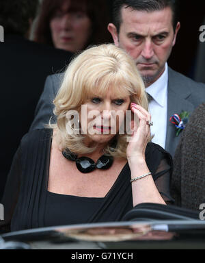 Shona Jardine leaves the funeral of her husband, ex Rangers footballer Sandy Jardine at Mortonhall crematorium in Edinburgh. Stock Photo