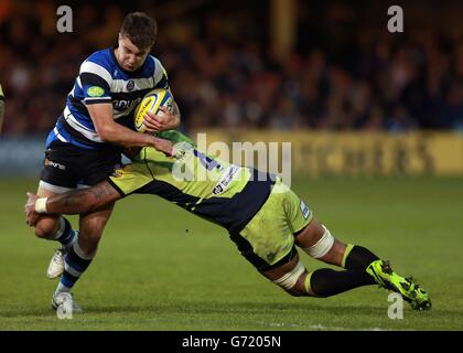 Rugby Union - Aviva Premiership - Bath Rugby v Northampton Saints - Recreation Ground. Bath's Ollie Devoto is tackled by Northampton's Samu Manoa during the Aviva Premiership match at the Recreation Ground, Bath. Stock Photo