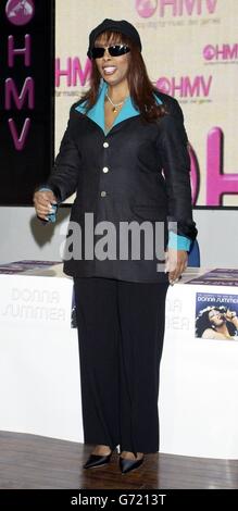 Disco diva Donna Summer poses for photographers during a signing at HMV music store in Oxford Street, central London to promote both her new book 'Ordinary Girl', and her latest album 'The Very Best Of Donna Summer'. Stock Photo