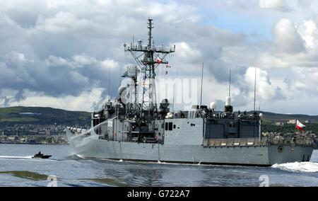 A Polish naval ship defends itself from simulated attack during a major military training exercise involving 15 nations at the HM Naval Base Clyde, Scotland. The exercise on the west coast of Scotland is designed to prepare the Royal Navy and RAF for the type of attack which claimed the lives of 17 US sailors aboard the USS Cole in 2000. Stock Photo