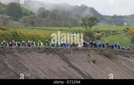 The Peloton travels along the North Antrim Coast during stage two of the 2014 Giro D'Italia, in Belfast. PRESS ASSOCIATION Photo. Picture date: Saturday May 10, 2014. Photo credit should read: Niall Carson/PA Wire Stock Photo