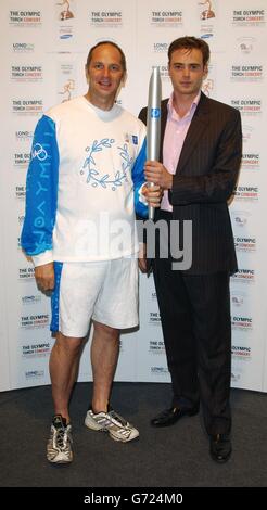 Olympic gold medallist Sir Steven Redgrave (left) and Jamie Theakston pose for photographers backstage, before performing at the Olympic Torch Concert in The Mall, central London, a free concert organised by Visit London and The Greater London Authority to celebrate the arrival of the Olympic torch in London. PA Photo : Ian West Stock Photo