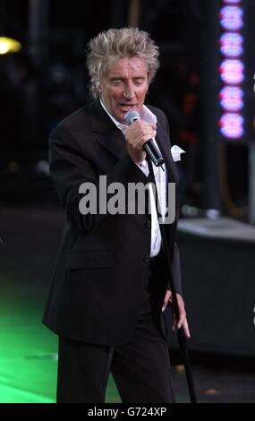 Rod Stewart performs live on stage at the Olympic Torch Concert in The Mall, central London a free concert organised by Visit London. Stock Photo