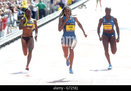 Great Britain's Shana Cox wins the Womens 200m on Deansgate, Manchester, with Stacey-Ann Smith (left) and Christine Ohuruogu (right), during the BT Great CityGames in Manchester City Centre. Stock Photo