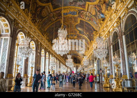 Visitors in the Hall of Mirrors, Palace of Versailles, Yvelines, Region Ile-de-France, France Stock Photo