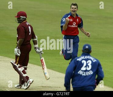 England's James Anderson celebrates after clean bowling West Indies Brian Lara for 6 during the NatWest series match at Headingley. Stock Photo