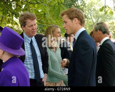Prince William talks to Earl Spencer, the brother of the late Diana, Princess of Wales, at the opening of a fountain built in memory of the princess in London's Hyde Park. The 3.6 million creation at the side of the Serpentine has been surrounded by controversy - facing delays and over-running its budget by 600,000. The Princess died in a car crash in Paris in August 1997. Stock Photo