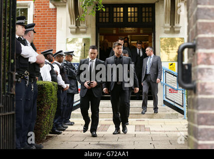 Blue boyband members Antony Costa (left) and Duncan James leave Ealing Magistrates' Court after they attended to support fellow band mate Lee Ryan who was handed a £3,325 fine and banned from the roads for two years today for failing to provide a specimen and causing £120 of criminal damage. Stock Photo