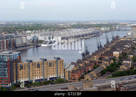 A general view from the window of a Emirates Air Line cab, of the Royal Victoria Docks, the Excel Exhibition Centre (left), and the Sunborn International vessel, London's first superyacht hotel, in east London. Stock Photo