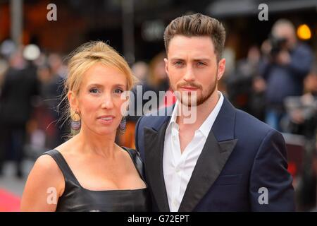 Sam Taylor-Wood and Aaron Taylor-Johnson arriving at the European premiere of Godzilla, at the Odeon Leicester Square, central London. Stock Photo