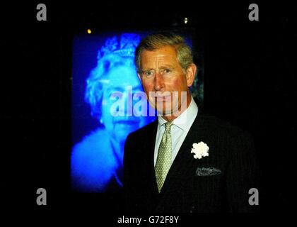 The Prince of Wales switches on the Queen's Holographic Portrait by artist Chris Levineon at the official unveiling at the Jersey Museum. The Prince is spending two days on the Channel Islands to celebrate their eight centuries of loyalty to the monarchy. In 1204, King John of England lost his possessions in Normandy but the Channel Islands decided to remain loyal to the English king rather than become part of France. Charles is travelling to Guernsey tomorrow but his visit by boat to tiny Herm island is under threat of cancellation due to the bad weather. See PA Story ROYAL Charles. Stock Photo