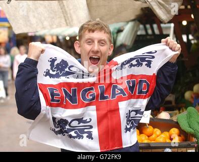 Wayne Rooney a 27-year-old fruit and vegetable seller in Mansfield, gets ready to support his namesake England striker in tonight's Euro 2004 match against Portugal. Stock Photo