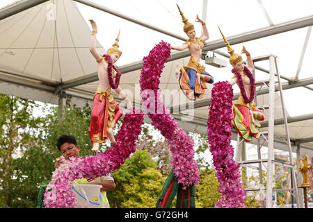 Workers making preparations at the Thailand Nong Nooch Tropical Botanical Garden, ahead of the Chelsea Flower Show at the Royal Hospital in Chelsea, London. Stock Photo