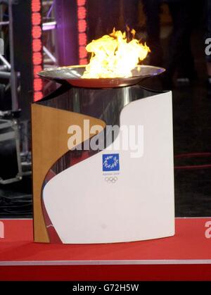 Olympic gold medallist Sir Steven Redgrave lights the Olympic cauldron on stage at the Olympic Torch Concert in The Mall, central London a free concert organised by Visit London and The Greater London Authority to celebrate the arrival of the Olympic torch in London. Stock Photo