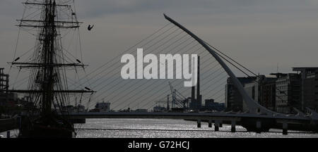 Diver Gary Hunt who will be competing in the Red Bull Cliff Diving championships at the Serpents Lair on Inis Mor, performs a leap from the mast of the Jeanie Johnston famine ship on the River Liffey in Dublin today to promote the event on June 28. Stock Photo