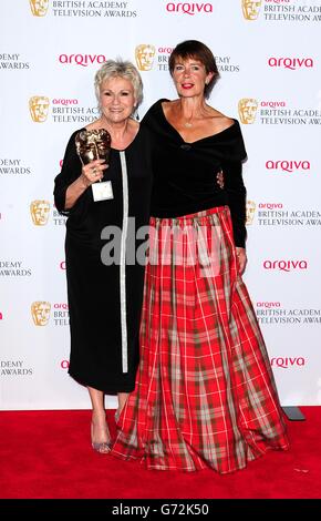 Julie Walters with the Academy Fellowship Award, alongside presenter Celia Imrie (right) at the Arqiva British Academy Television Awards 2014 at the Theatre Royal, Drury Lane, London. Stock Photo