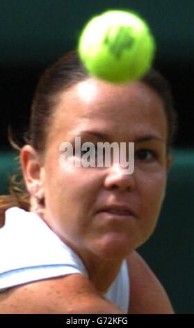 Lindsay Davenport from the USA in action against Maria Sharapova from Russia in the semi-final of the Ladies' Singles tournament of The Lawn Tennis Championships at Wimbledon, London. , NO MOBILE PHONE USE. Stock Photo