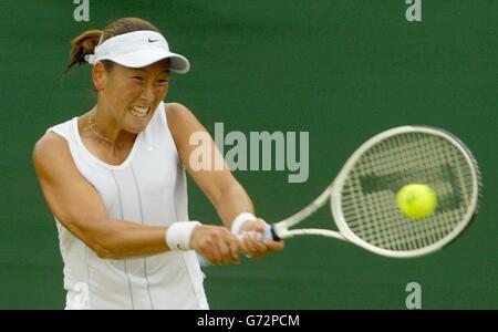 Ai Sugiyama from Japan in action against Tamarine Tanasugarn from Thailand at the Lawn Tennis Championships in Wimbledon, London. Sugiyama won in straight sets 3:6/7:5. , NO MOBILE PHONE USE. Stock Photo