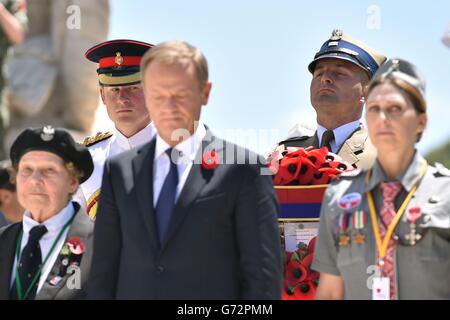 Prince Harry (left) and Polish Prime Minister Donald Tusk (second from left) prepare to lay wreaths at a commemoration service at Monte Cassino cemetery on the first day of his tour to Italy. Stock Photo