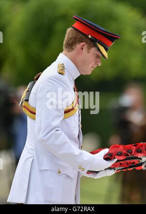 Prince Harry lays a wreath at a memorial during a British commemoration at the Cassino Commonwealth War Cemetery on the second day of his tour to Italy. Stock Photo