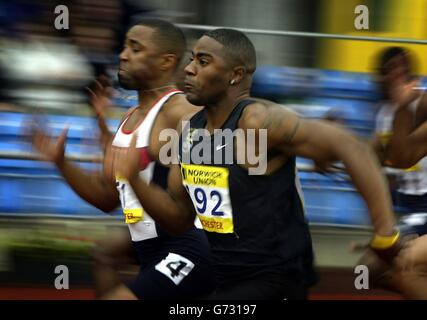 Darren Campbell (left) and Mark Lewis-Francis in action during the 100 metres semi-final on day one of the Norwich Union Olympic Trials and Amateur Athletics Association Championships at the Manchester Regional Arena. Stock Photo