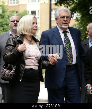 Veteran entertainer Rolf Harris arriving with daughter Bindi at Southwark Crown Court, London, where he denies 12 counts of indecent assault between 1968 and 1986. Stock Photo